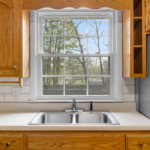 DW Properties - 1283 Hillwood Drive - Property for Rent - Kitchen sink and window